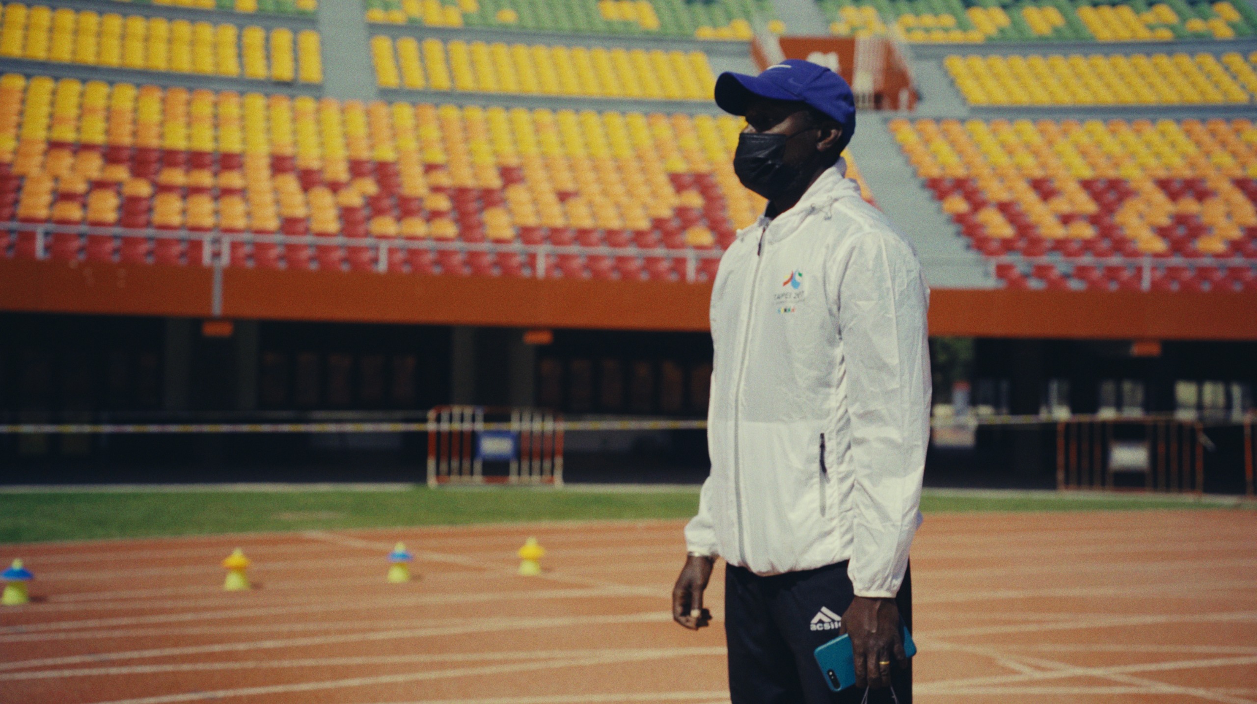 Coach Nicolas at the track